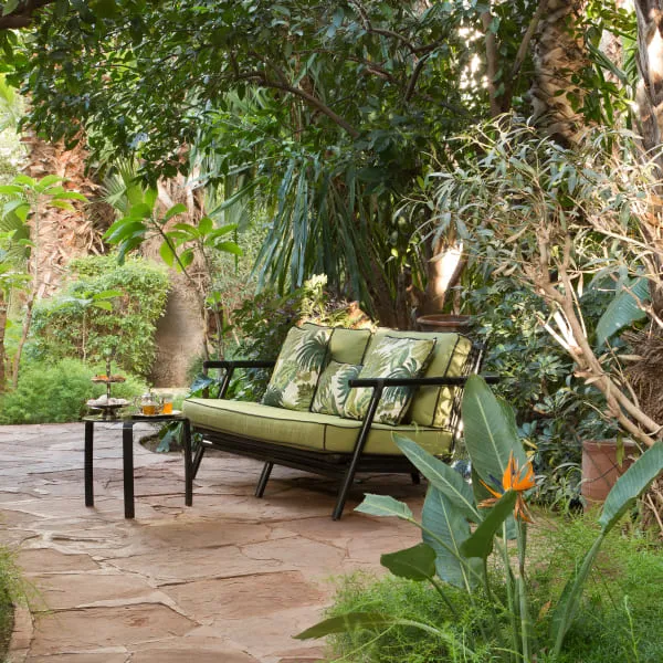 Shaded garden seating at Les Jardins de la Médina in Marrakech